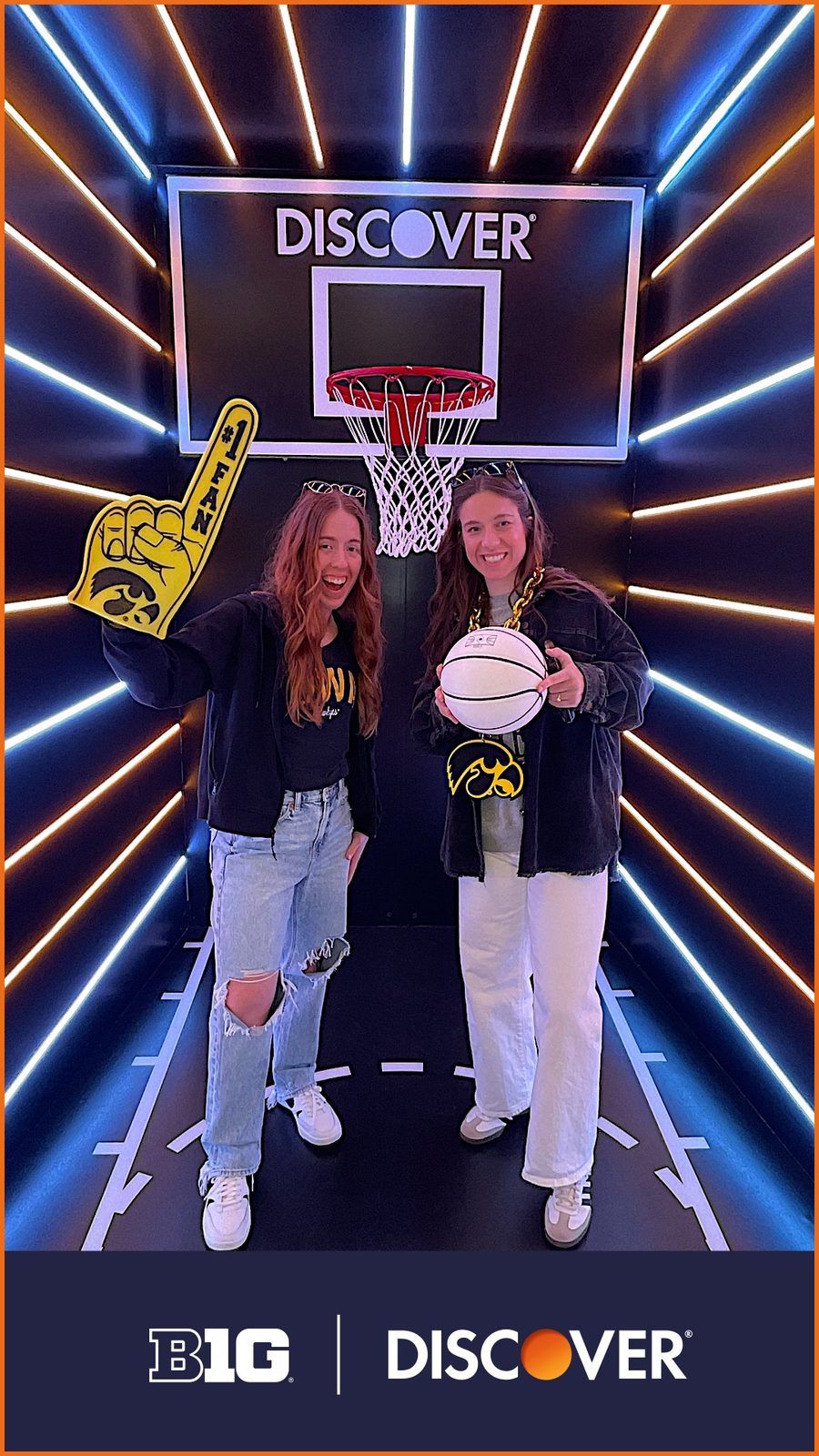 Discover branded photo booth with a basketball hoop set at a Big Ten fan event