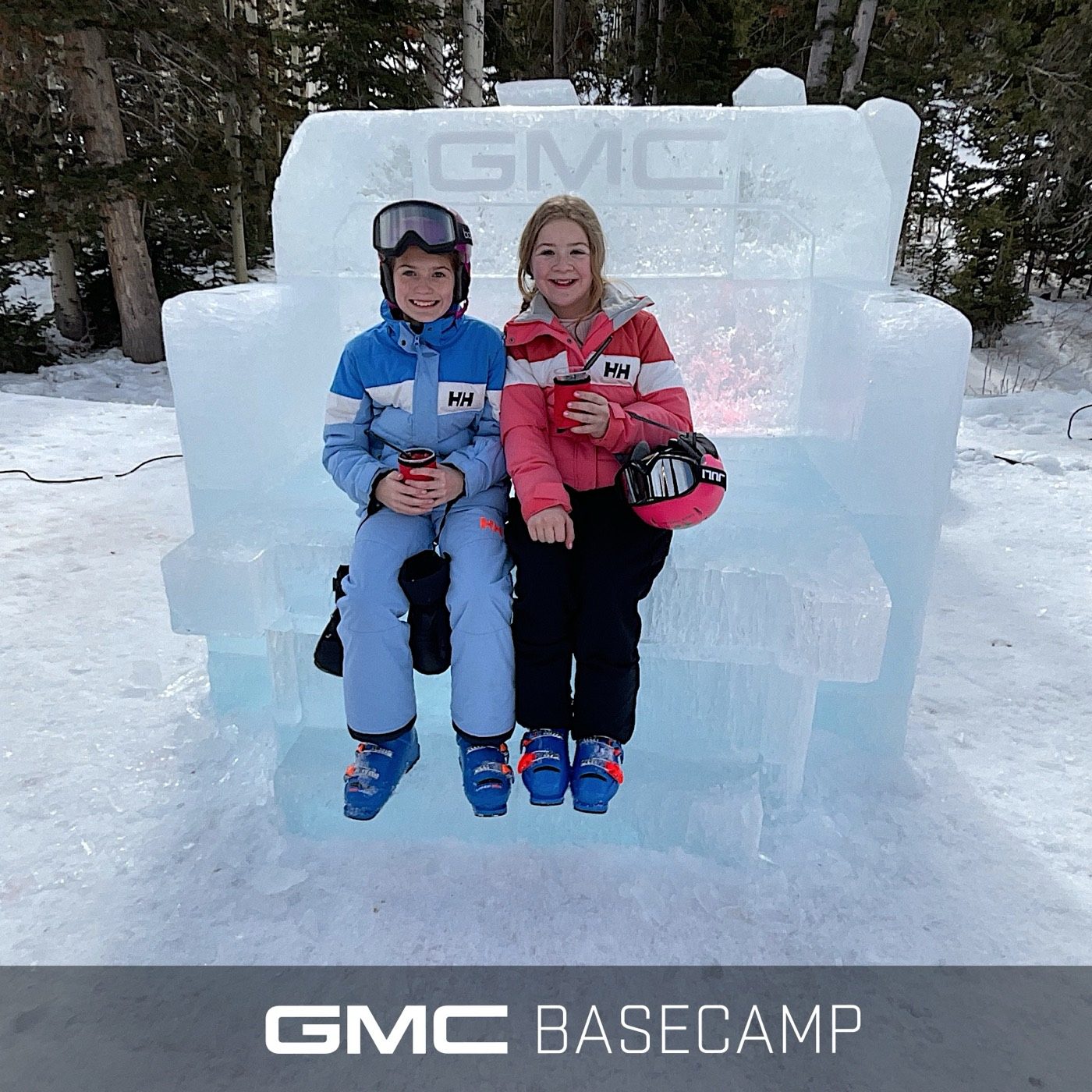GMC Basecamp photo booth beside an ice truck at an outdoor activation